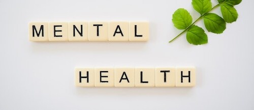letter tiles spell out mental health
